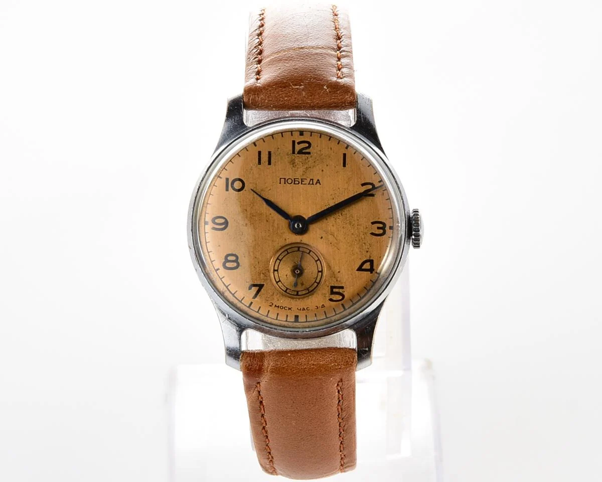 Vintage Soviet Pobeda watch with bronze dial, 3rd quarter of 1955