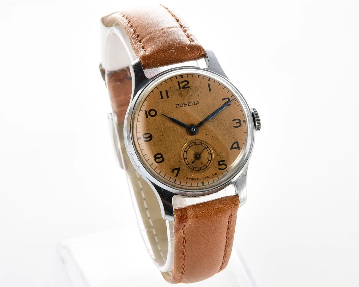 Vintage Soviet Pobeda watch with bronze dial, 3rd quarter of 1955