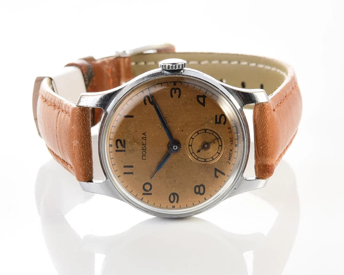 Vintage Soviet Pobeda watch with bronze dial, 3rd quarter of 1955