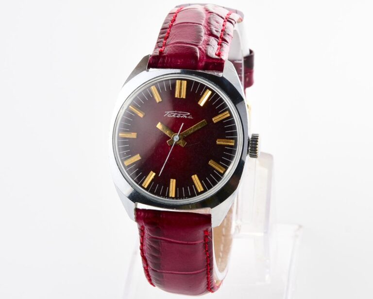 Vintage soviet RAKETA mechanical watch with stark crimson dial