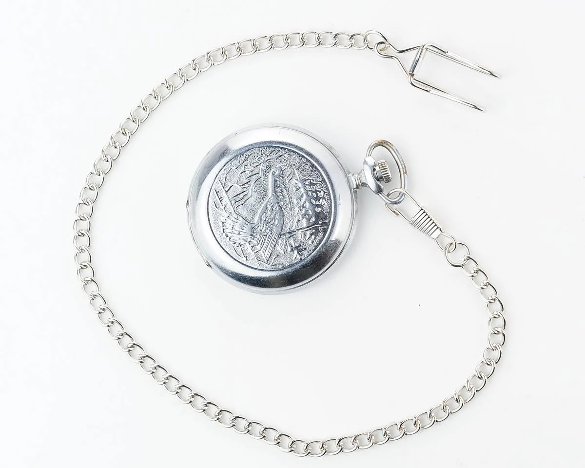 Molnija pocket watch with grouse bird & red dial