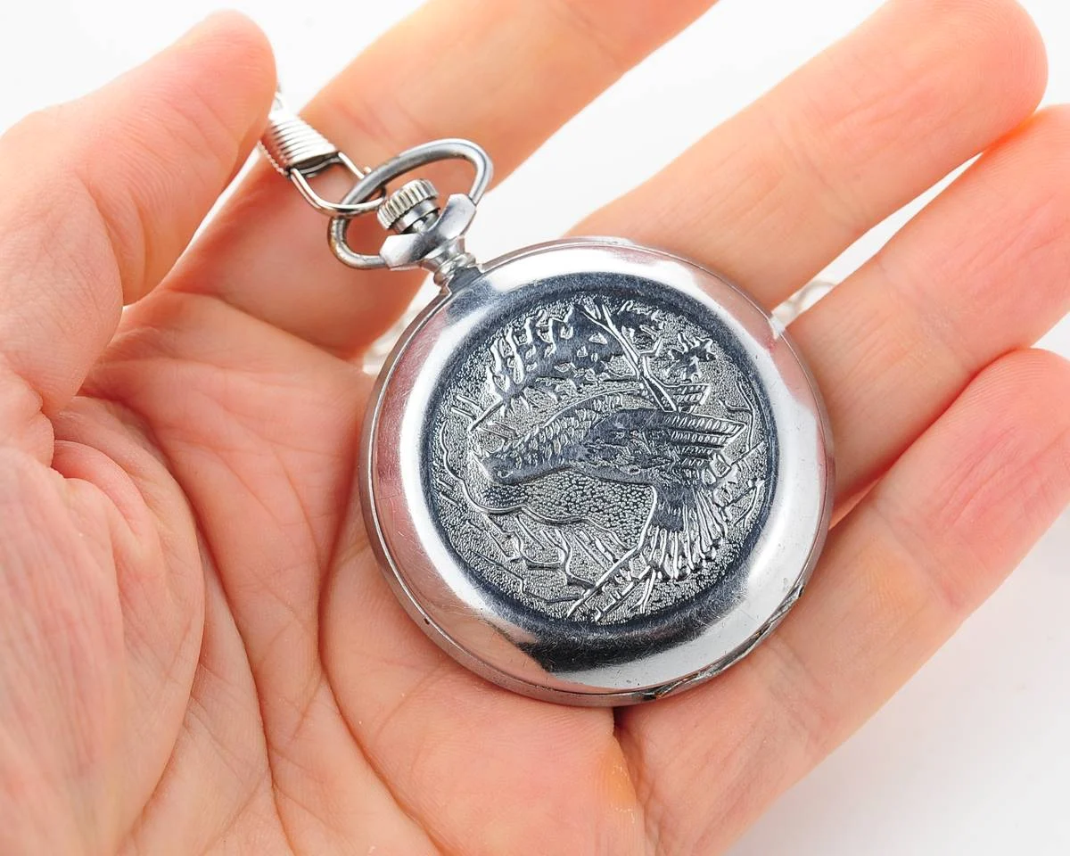 Molnija pocket watch with grouse bird & red dial