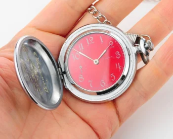 Molnija pocket watch with grouse bird & red dial