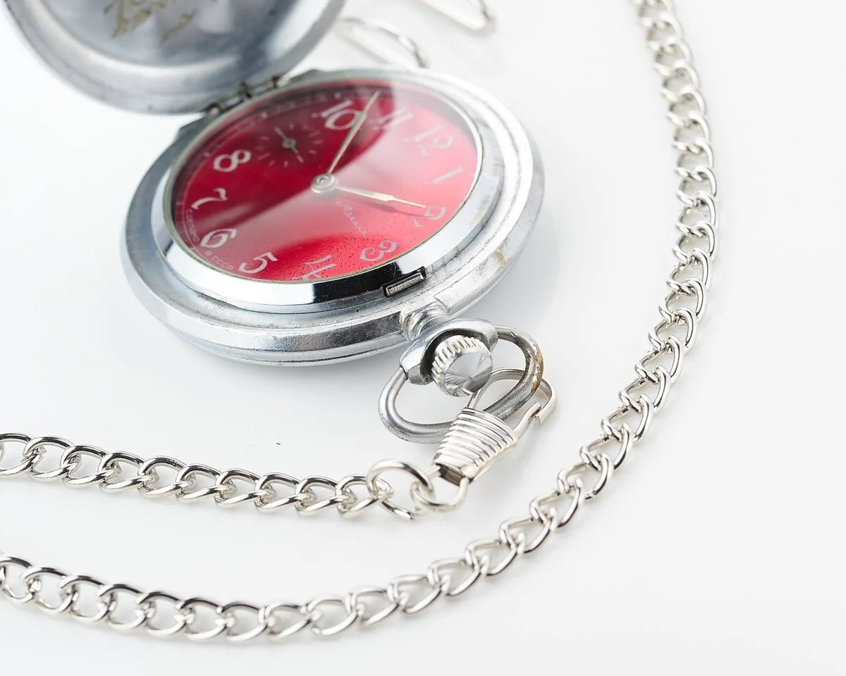 Molnija pocket watch with grouse bird & red dial