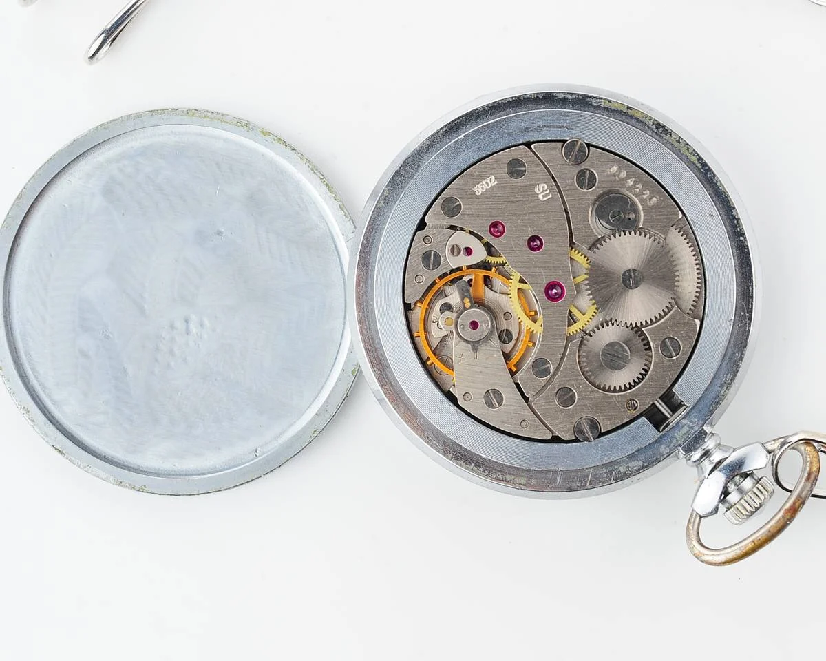 Molnija pocket watch with grouse bird & red dial