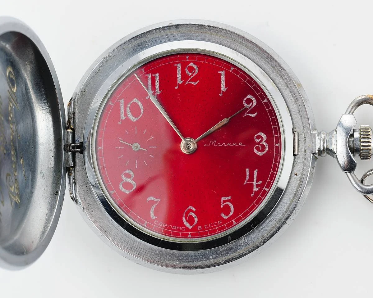 Molnija pocket watch with grouse bird & red dial