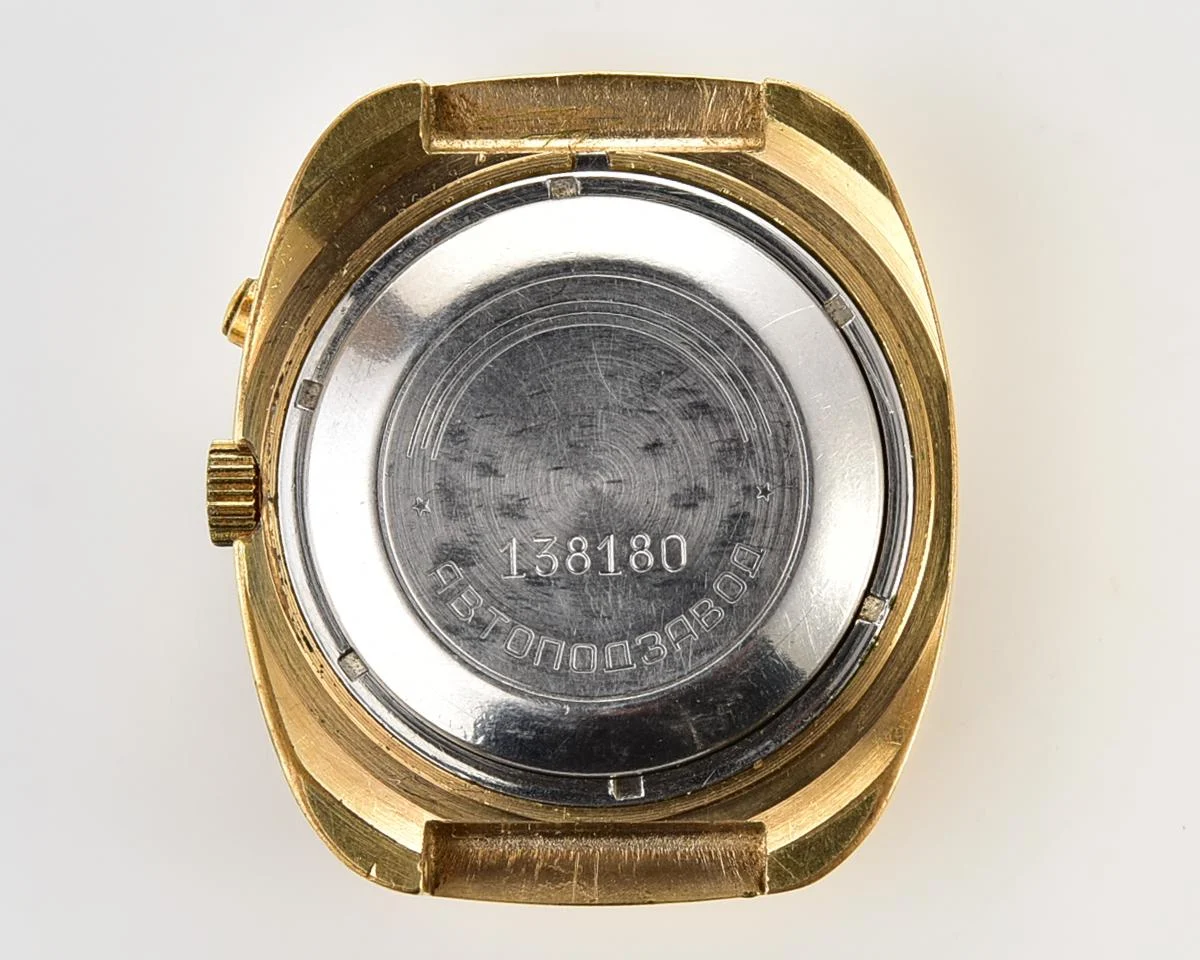 Slava vintage Soviet gold-plated mechanical watch with automatic self-winding movement