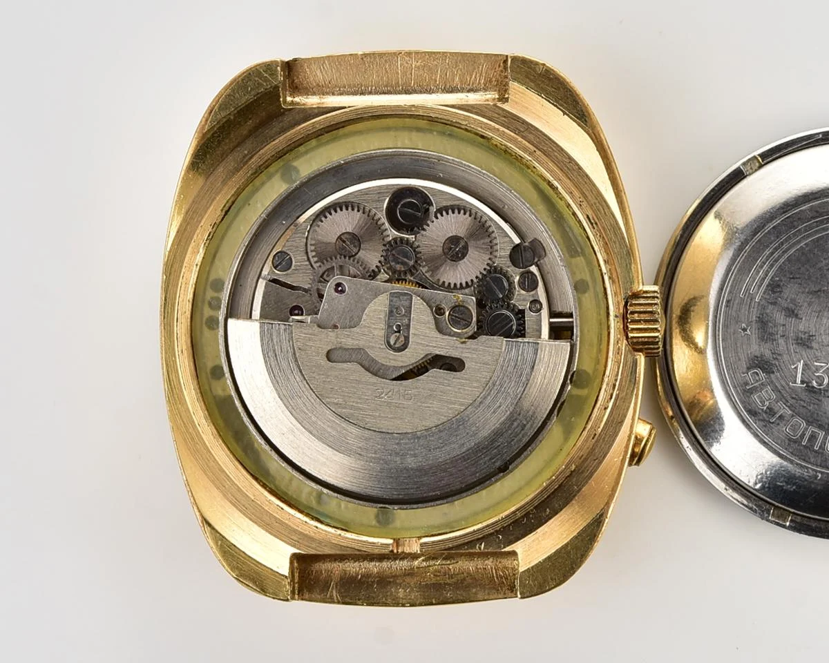 Slava vintage Soviet gold-plated mechanical watch with automatic self-winding movement