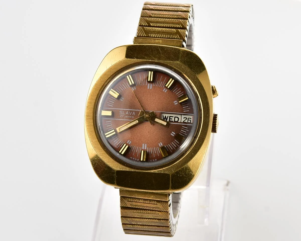 Slava vintage Soviet gold-plated mechanical watch with automatic self-winding movement