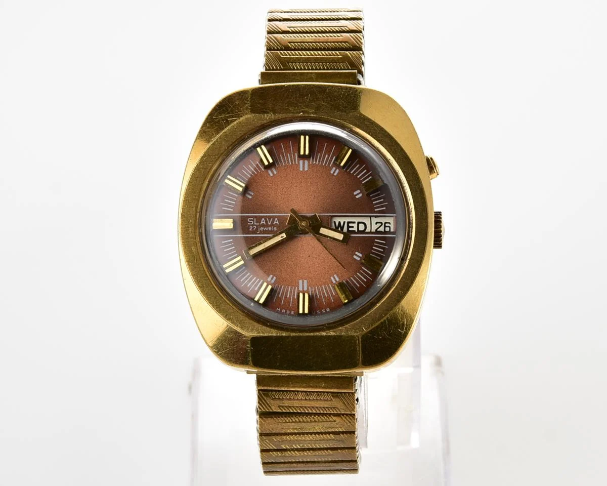 Slava vintage Soviet gold-plated mechanical watch with automatic self-winding movement