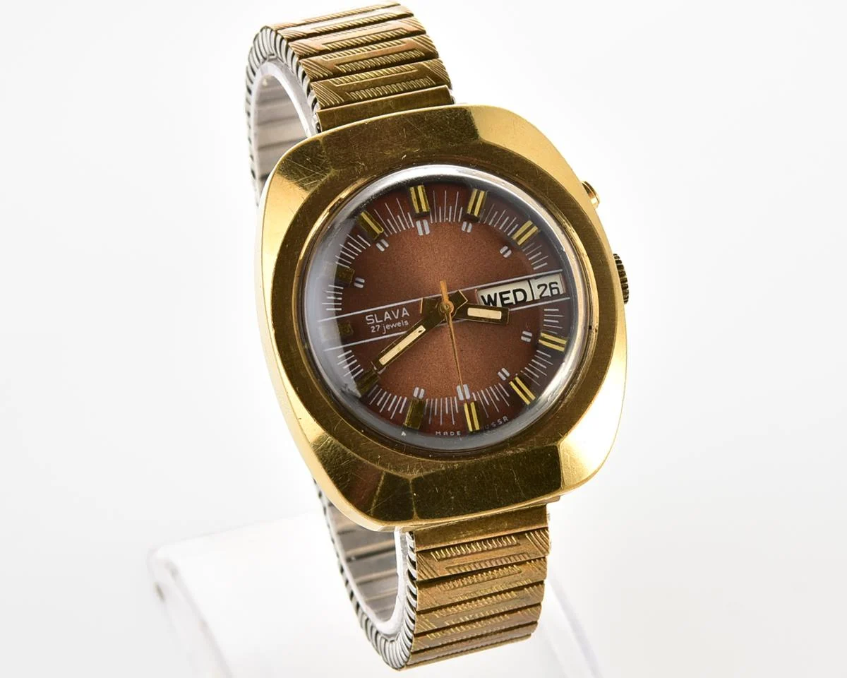Slava vintage Soviet gold-plated mechanical watch with automatic self-winding movement