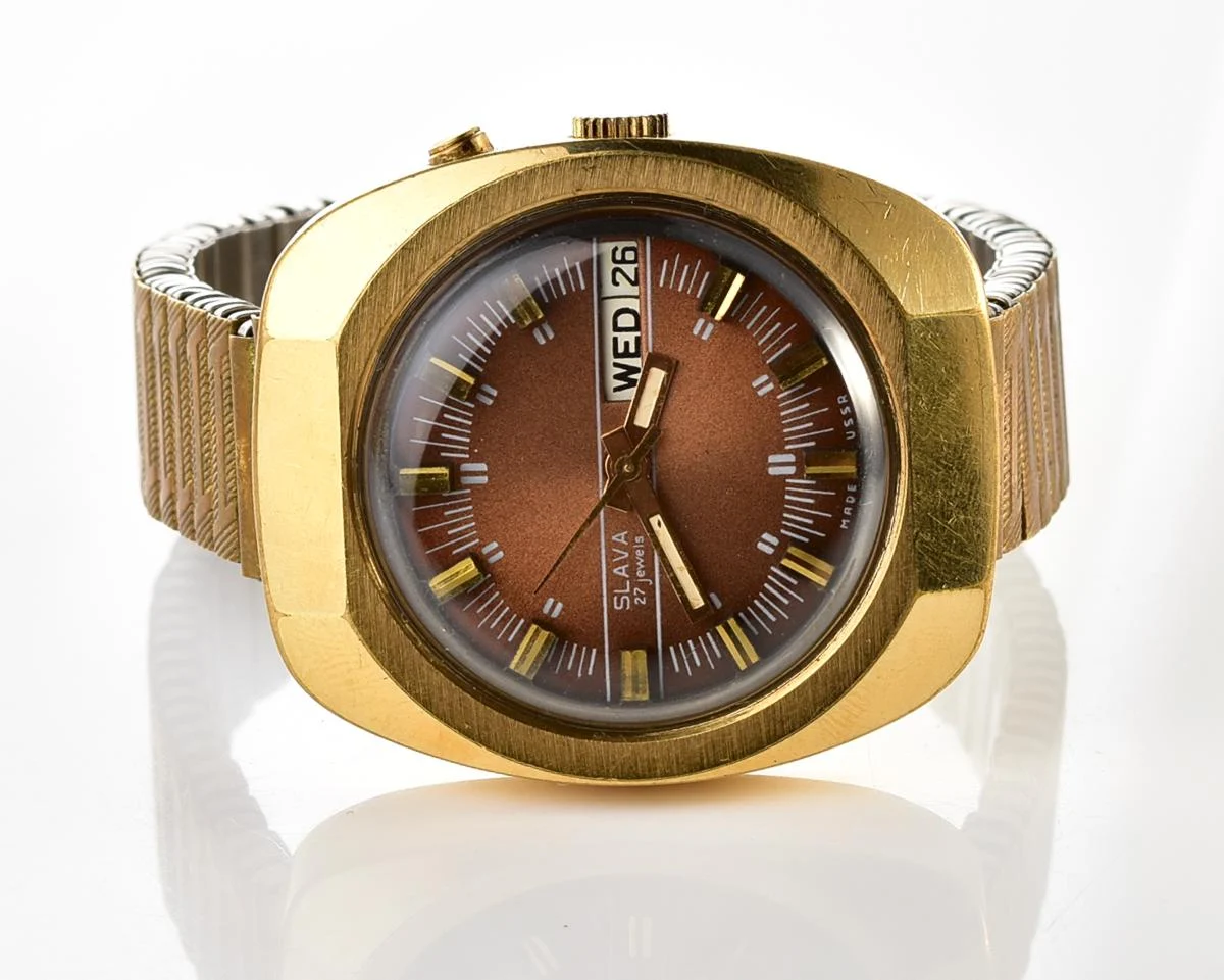 Slava vintage Soviet gold-plated mechanical watch with automatic self-winding movement