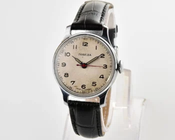 Vintage Pobeda watch with central seconds hand and diamond shaped crown!