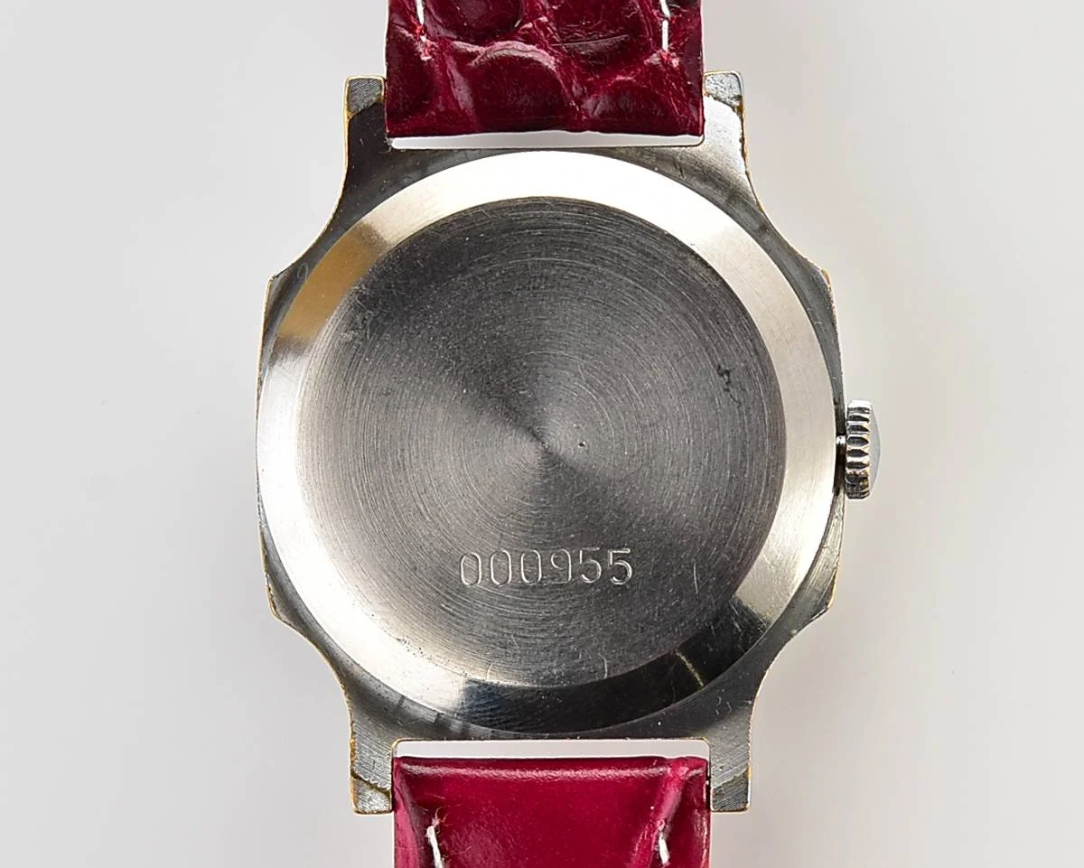 Pobeda Soviet mechanical wrist watch with crimson dial