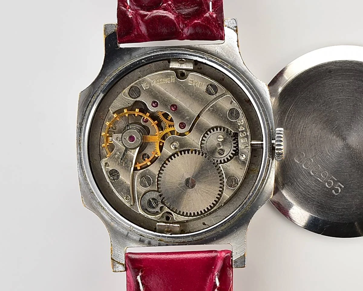 Pobeda Soviet mechanical wrist watch with crimson dial