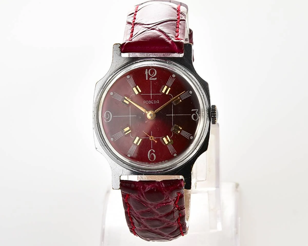Pobeda Soviet mechanical wrist watch with crimson dial