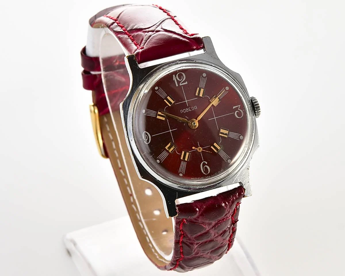Pobeda Soviet mechanical wrist watch with crimson dial
