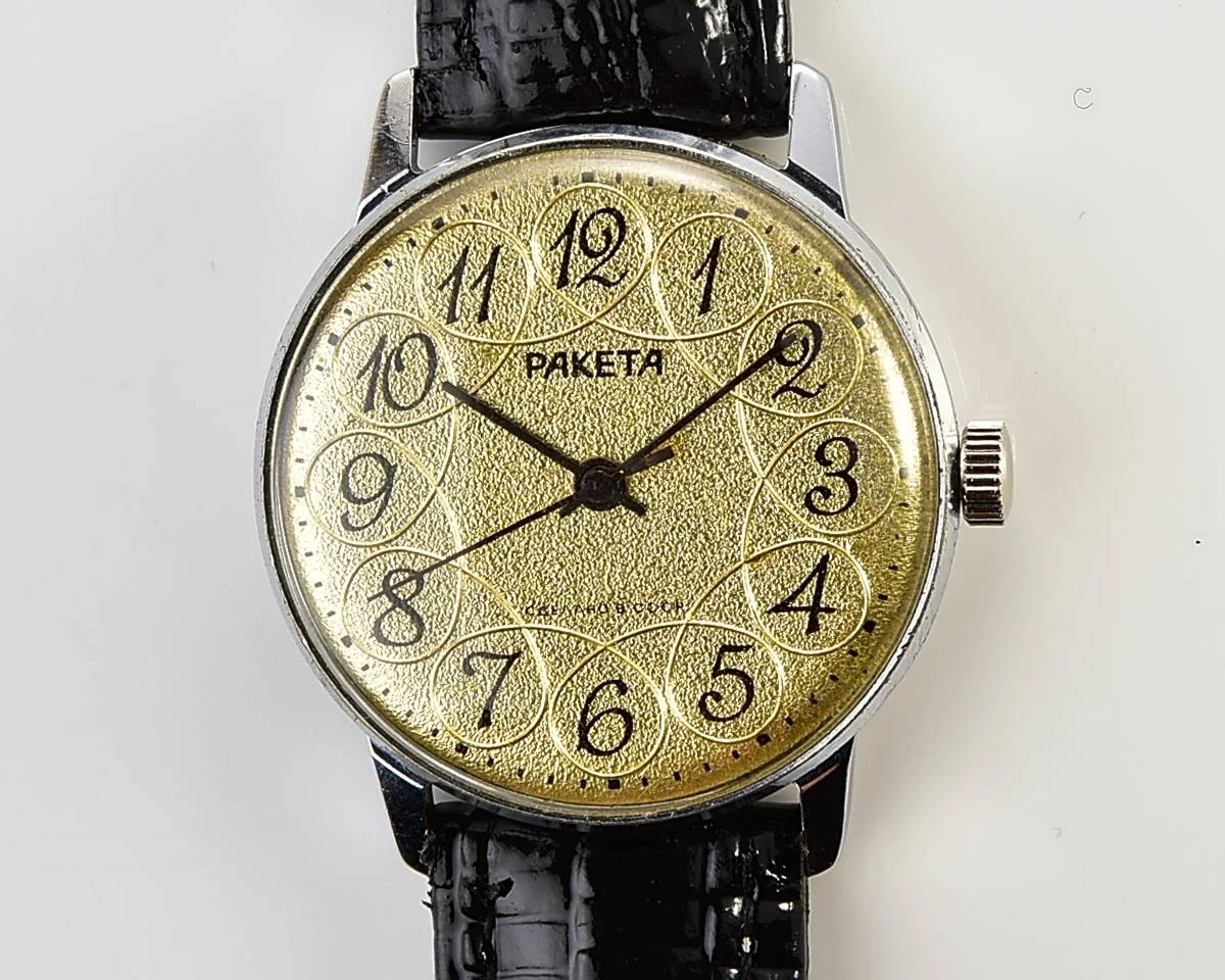 Vintage Soviet Raketa mechanical watch with intricate dial
