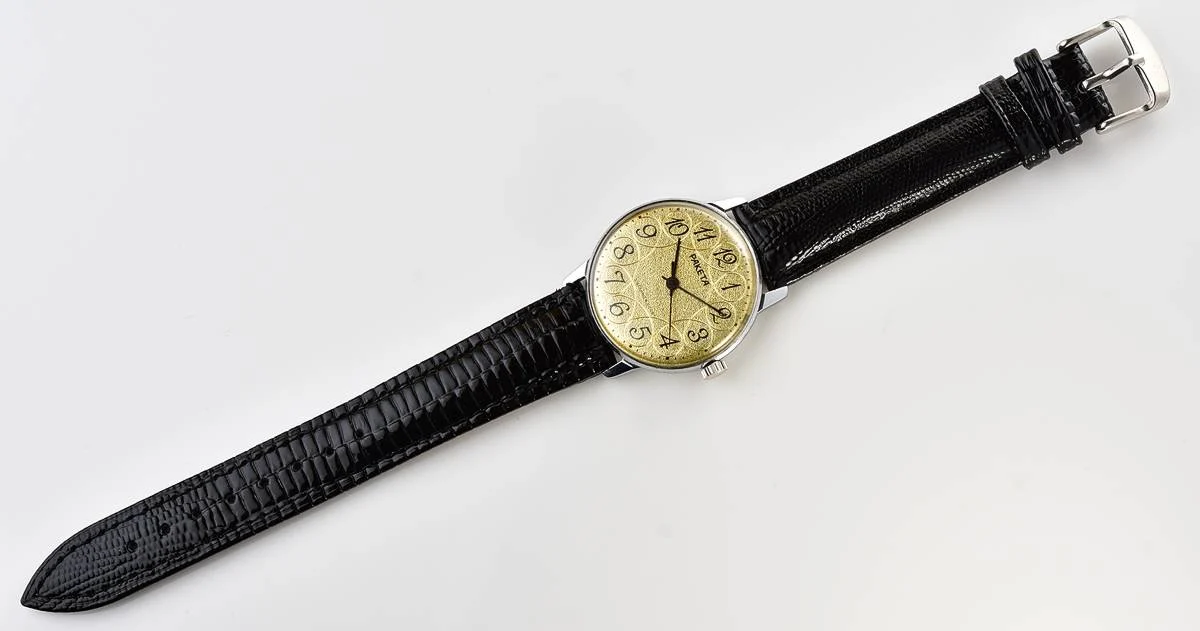 Vintage Soviet Raketa mechanical watch with intricate dial