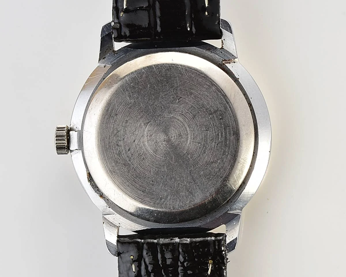 Vintage Soviet Raketa mechanical watch with intricate dial