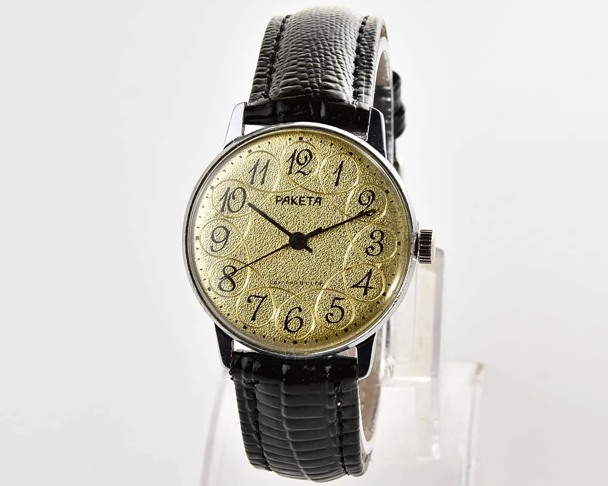 Vintage Soviet Raketa mechanical watch with intricate dial