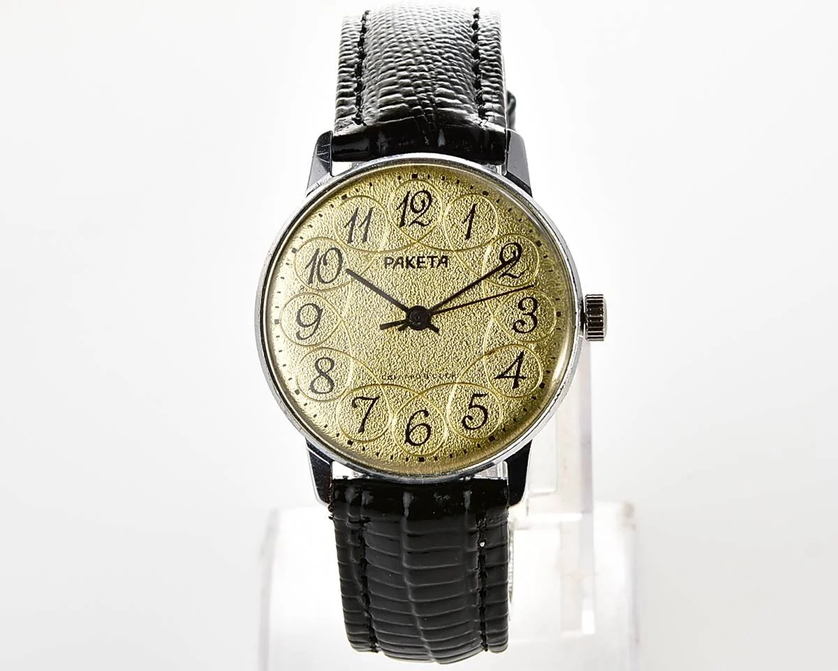 Vintage Soviet Raketa mechanical watch with intricate dial