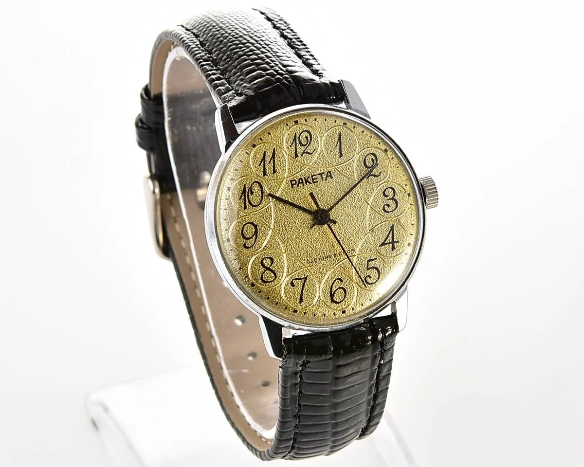 Vintage Soviet Raketa mechanical watch with intricate dial