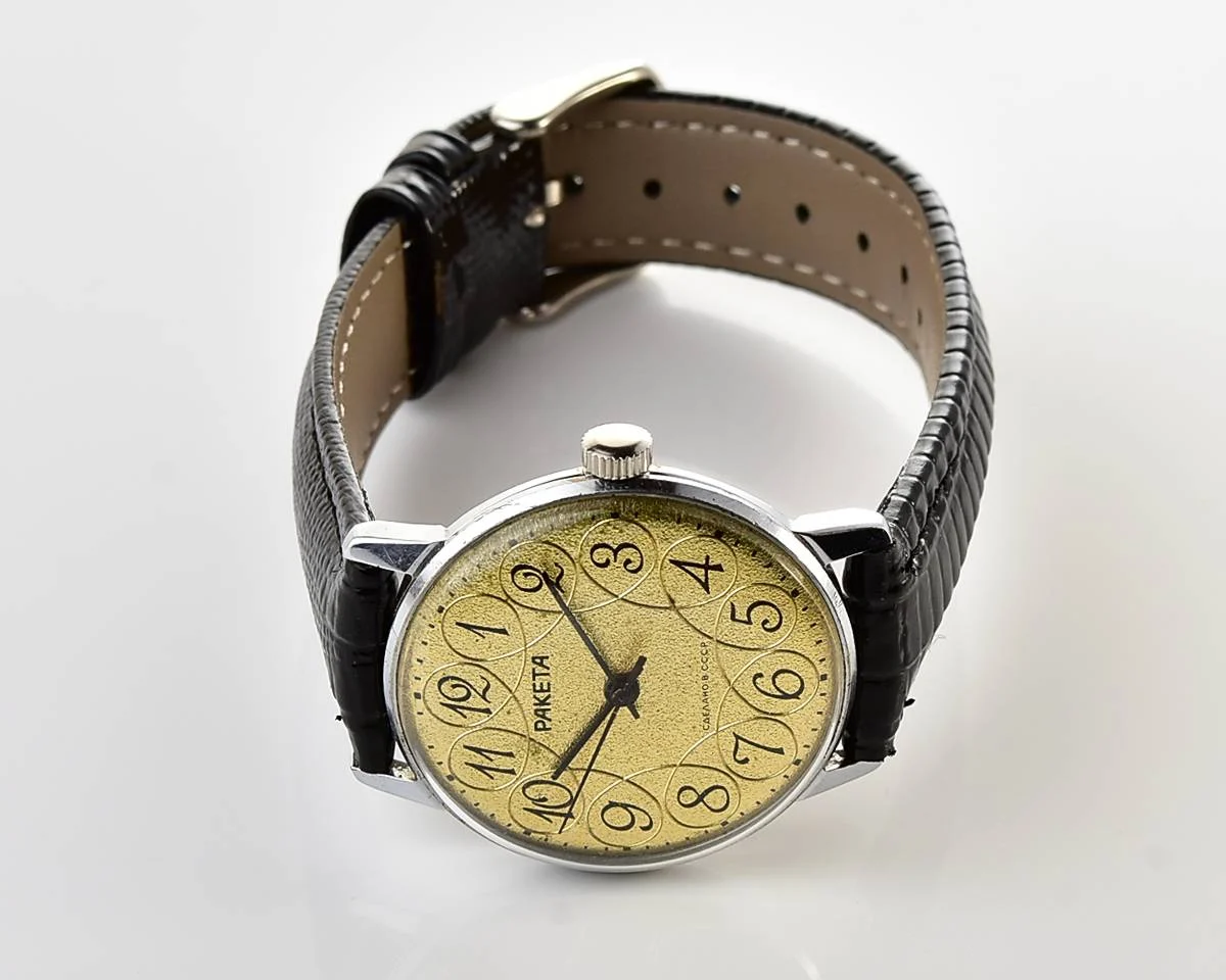 Vintage Soviet Raketa mechanical watch with intricate dial