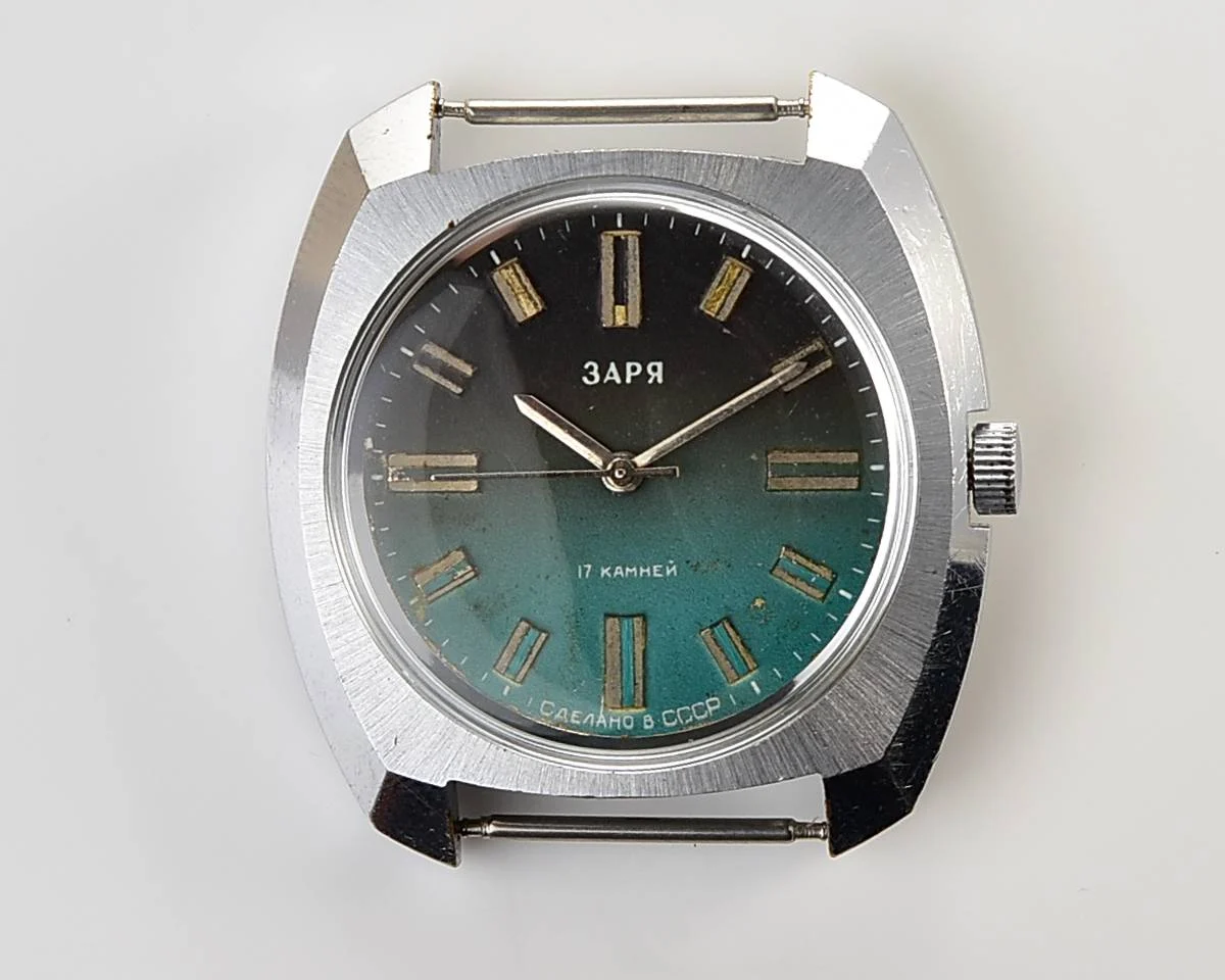 Vintage Soviet mechanical Zaria watch with teal dial
