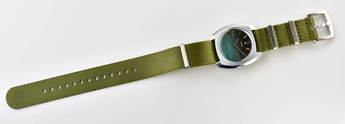 Vintage Soviet mechanical Zaria watch with teal dial