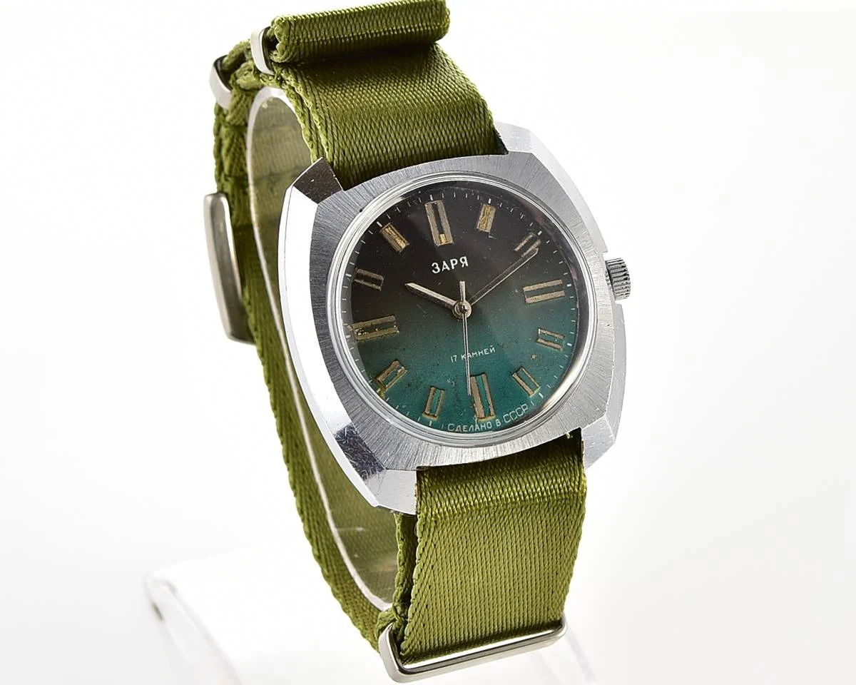 Vintage Soviet mechanical Zaria watch with teal dial
