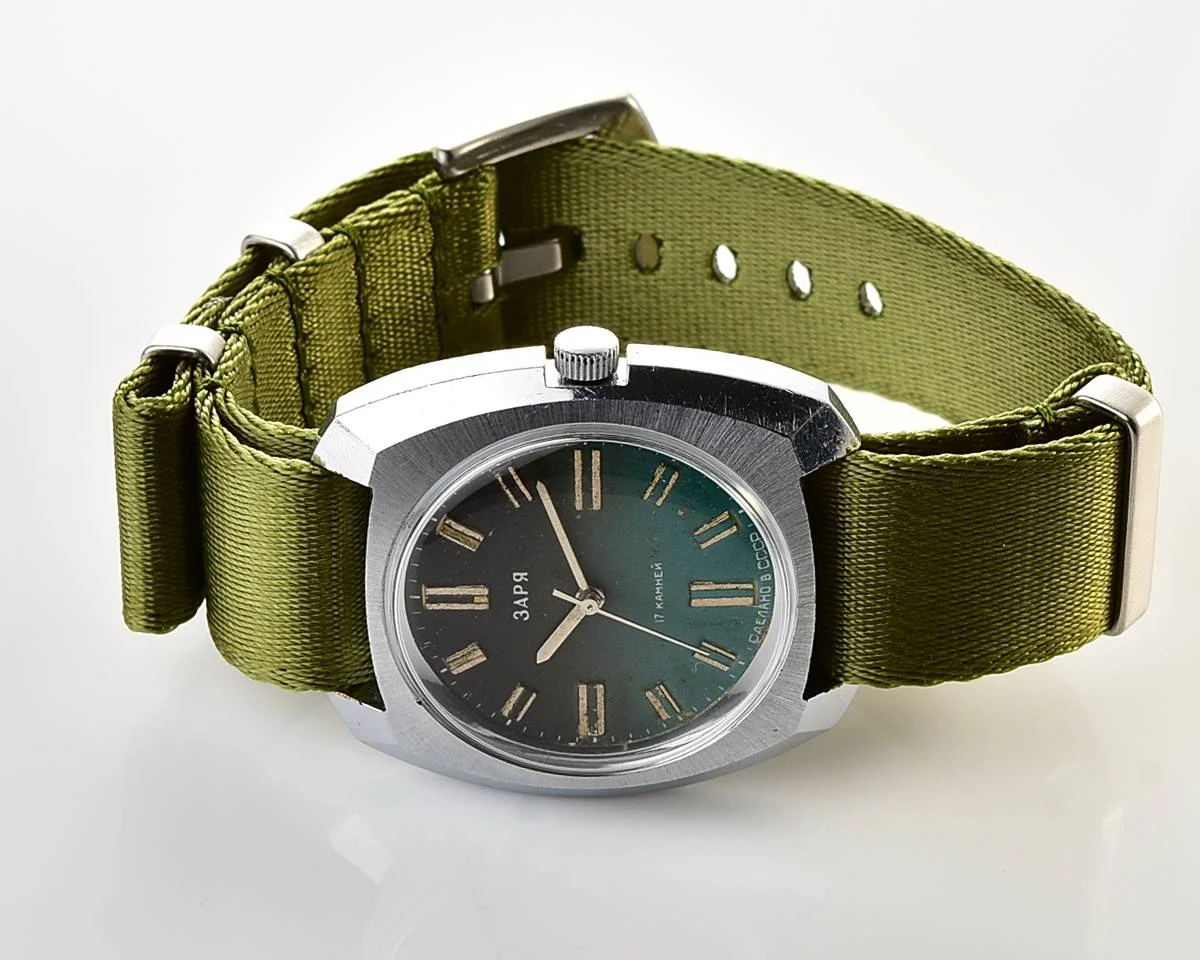 Vintage Soviet mechanical Zaria watch with teal dial