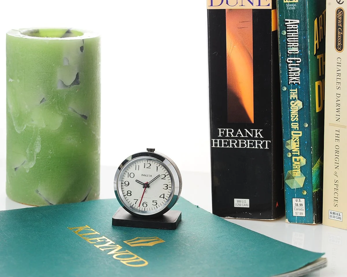 Small Raketa Soviet mechanical alarm clock - less then 2 inches in diameter