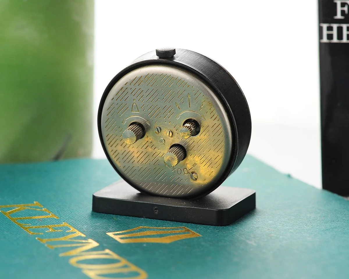 Small Raketa Soviet mechanical alarm clock - less then 2 inches in diameter