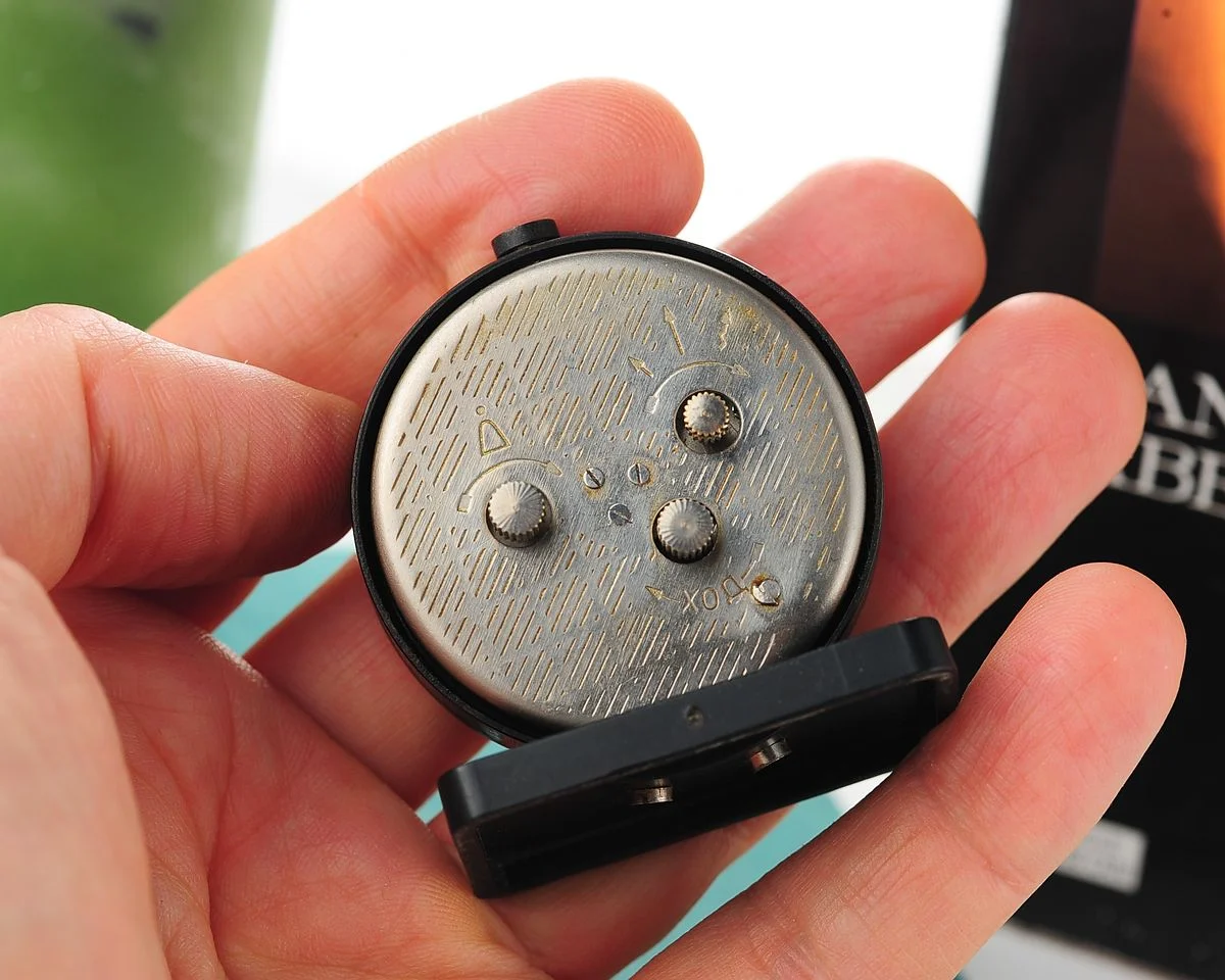 Small Raketa Soviet mechanical alarm clock - less then 2 inches in diameter