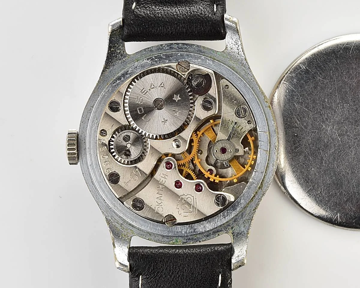 Vintage Soviet Pobeda watch with bronze dial, 1st quarter of 1957