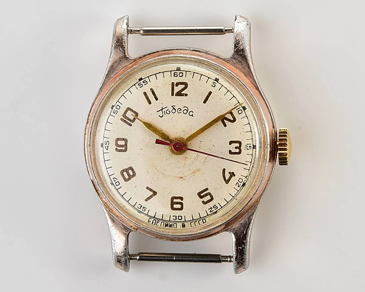 Pobeda Soviet mechanical watch with central seconds hand