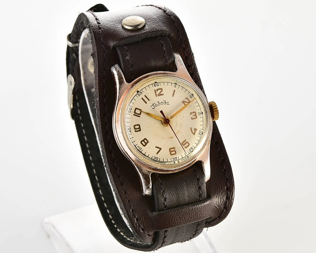 Pobeda Soviet mechanical watch with central seconds hand