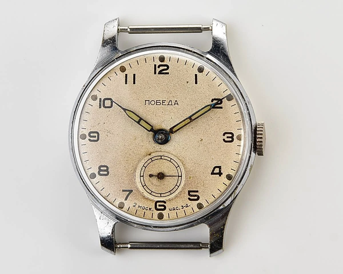 Excellent Soviet Pobeda from 1957 + exquisite Sturmanskie compass leather strap!