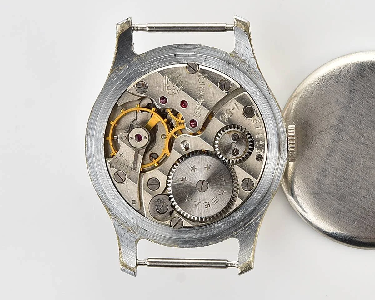 Excellent Soviet Pobeda from 1957 + exquisite Sturmanskie compass leather strap!