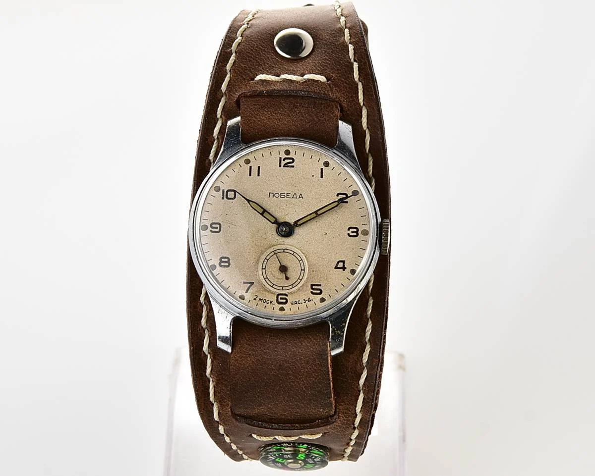 Excellent Soviet Pobeda from 1957 + exquisite Sturmanskie compass leather strap!