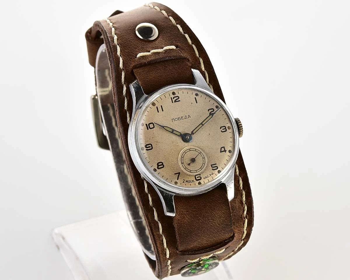 Excellent Soviet Pobeda from 1957 + exquisite Sturmanskie compass leather strap!