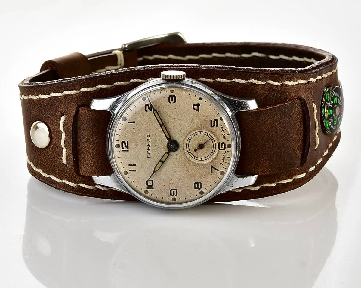 Excellent Soviet Pobeda from 1957 + exquisite Sturmanskie compass leather strap!