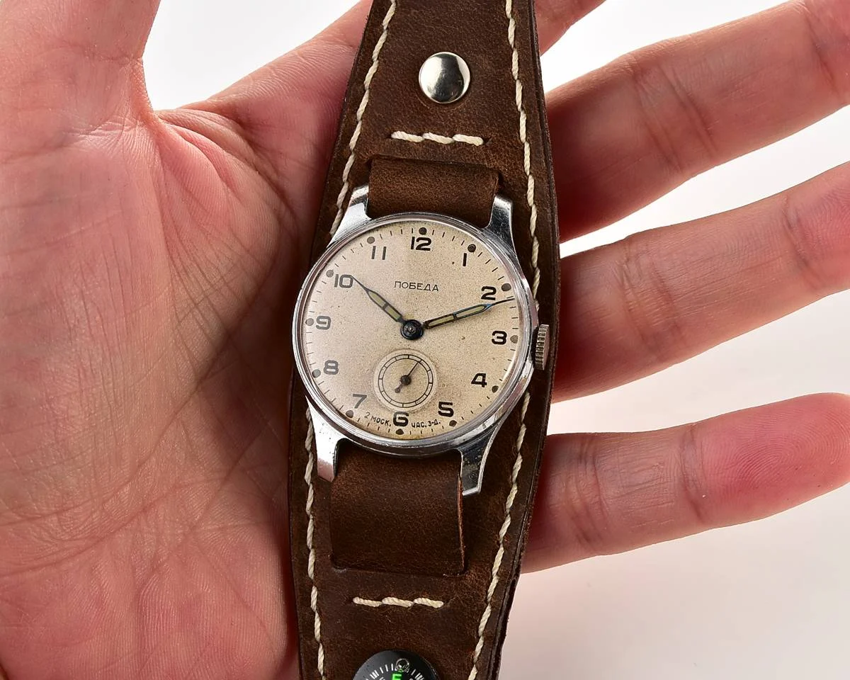 Excellent Soviet Pobeda from 1957 + exquisite Sturmanskie compass leather strap!