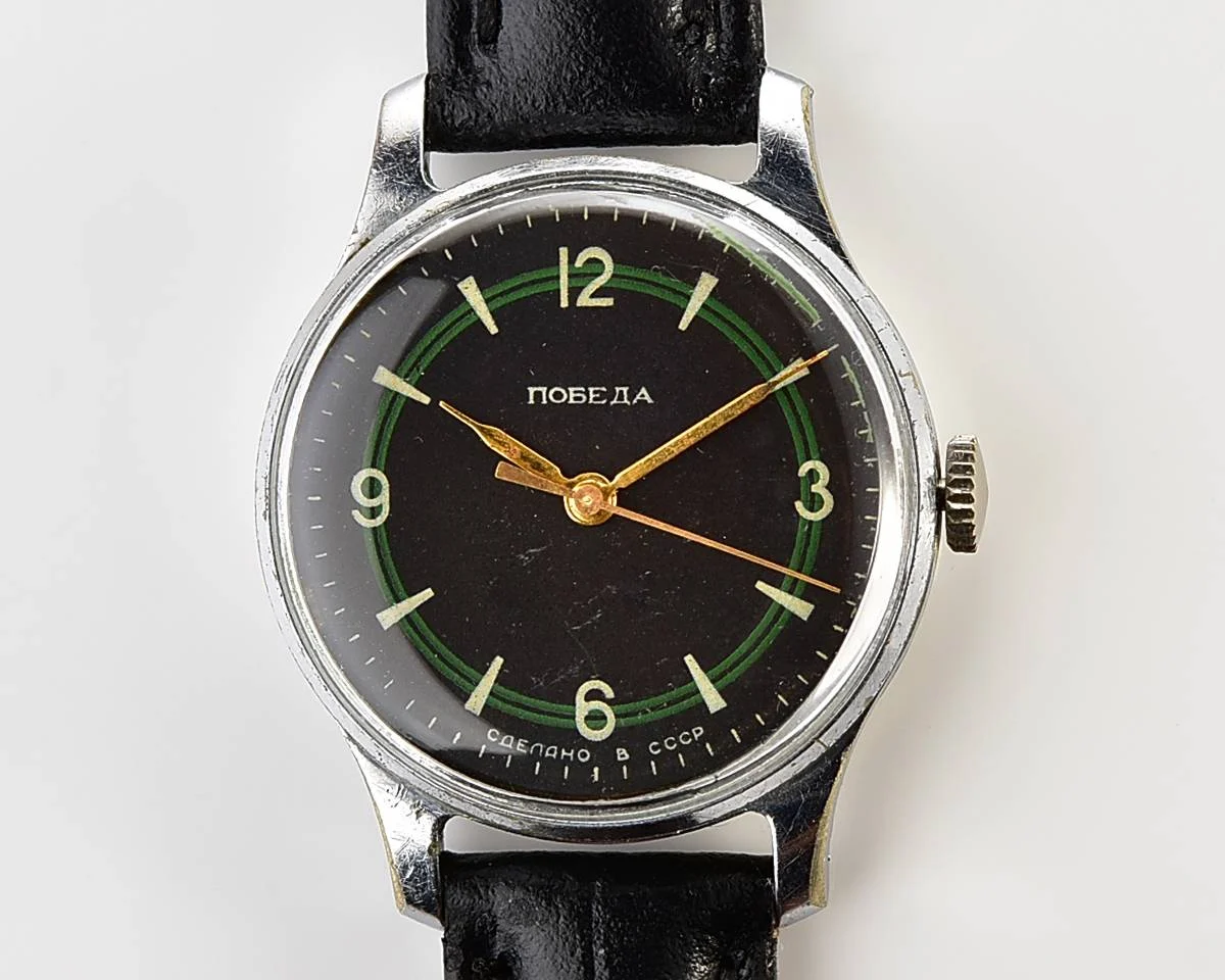 Vintage Soviet mechanical Pobeda with central seconds hand