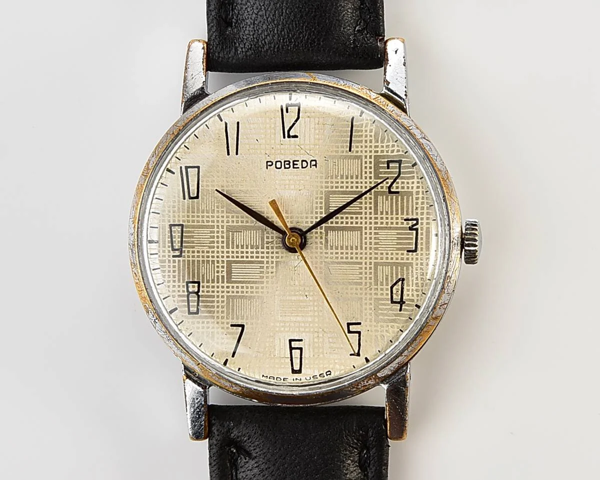 Vintage Soviet mechanical Pobeda watch with central seconds hand