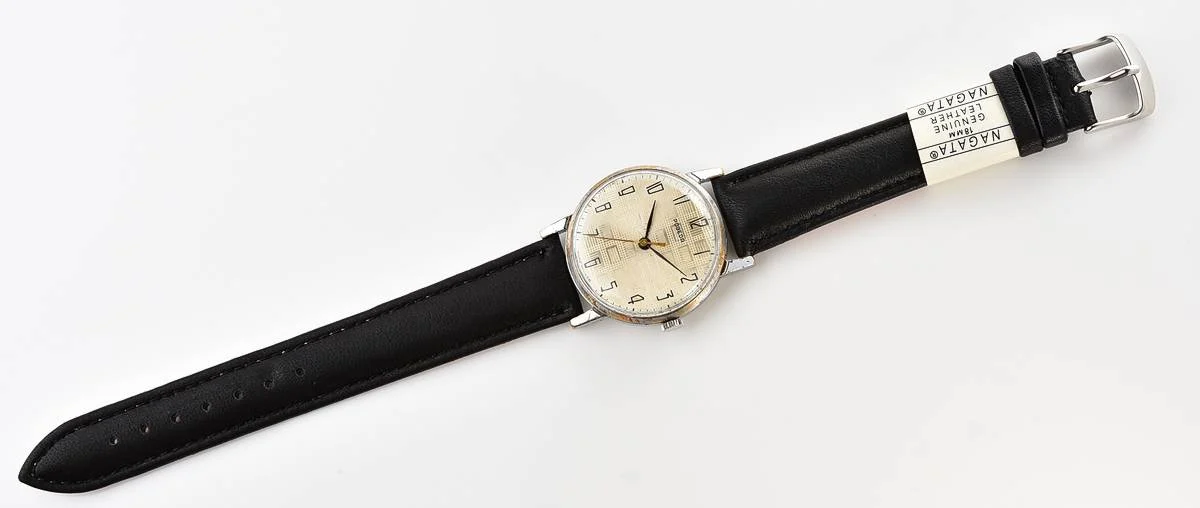 Vintage Soviet mechanical Pobeda watch with central seconds hand