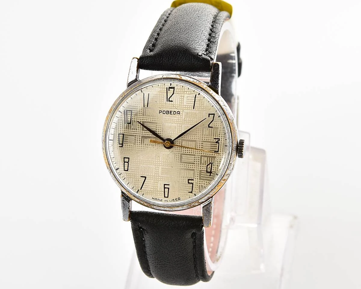Vintage Soviet mechanical Pobeda watch with central seconds hand