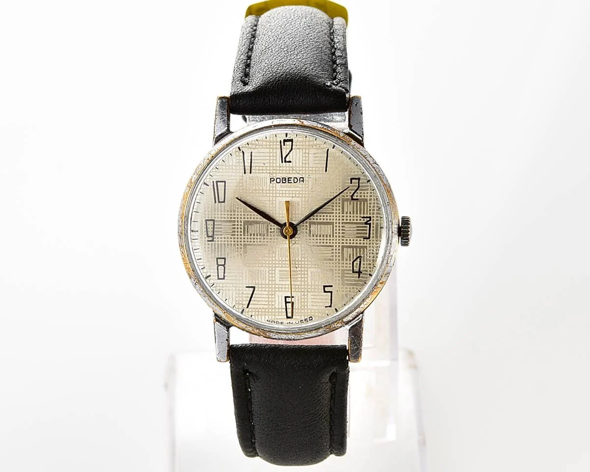 Vintage Soviet mechanical Pobeda watch with central seconds hand