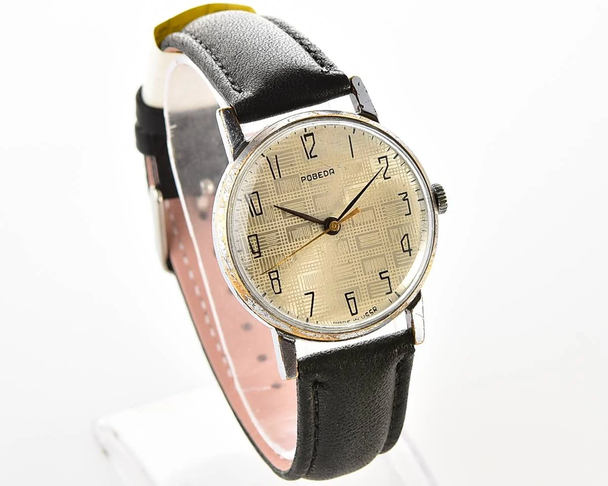 Vintage Soviet mechanical Pobeda watch with central seconds hand
